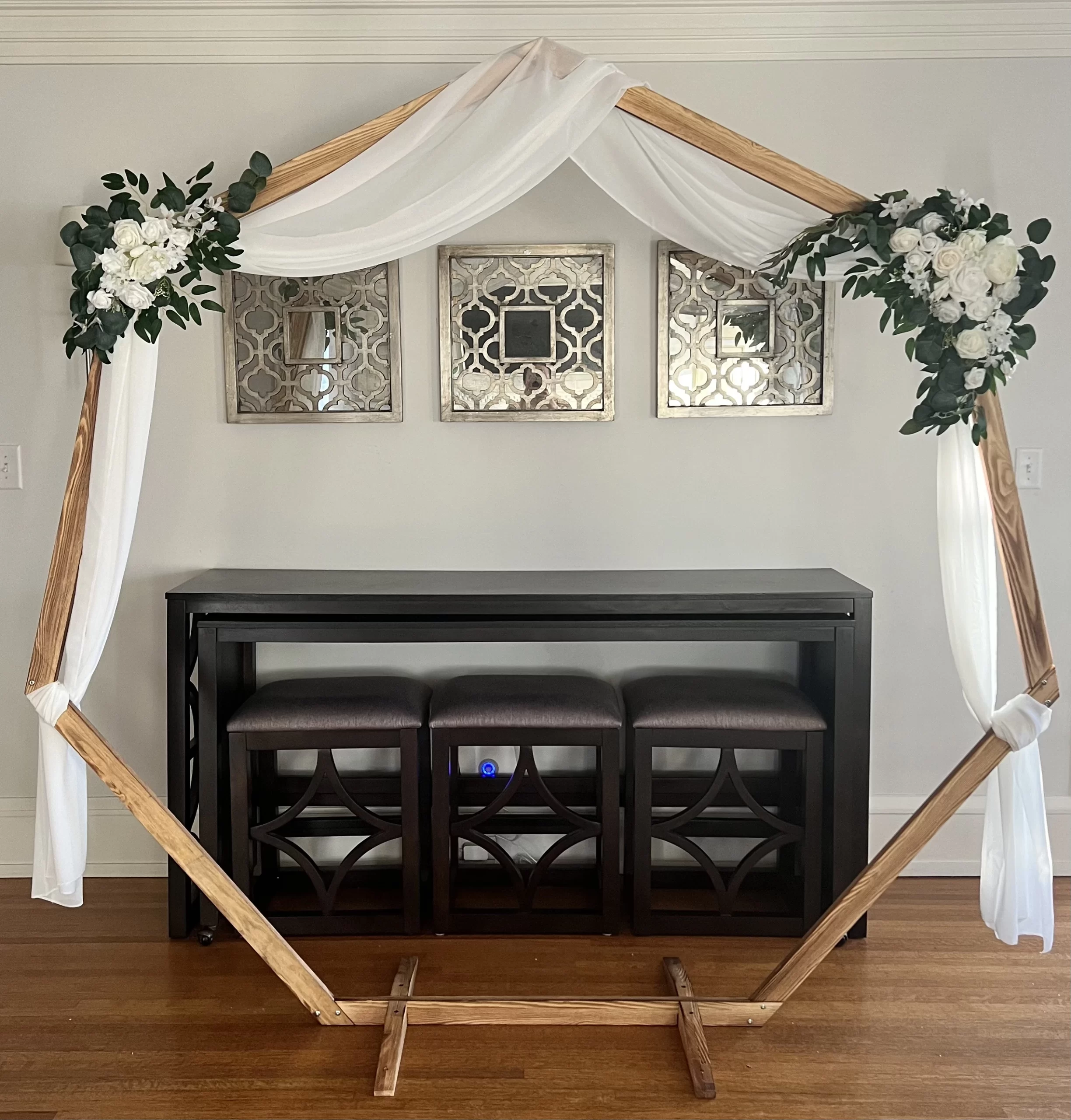 Heptagonal Wood Arch – 7.2′ (Comes with or without flowers and drapery)